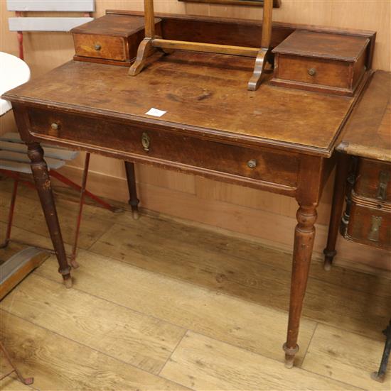 A Victorian mahogany writing table W.90cm